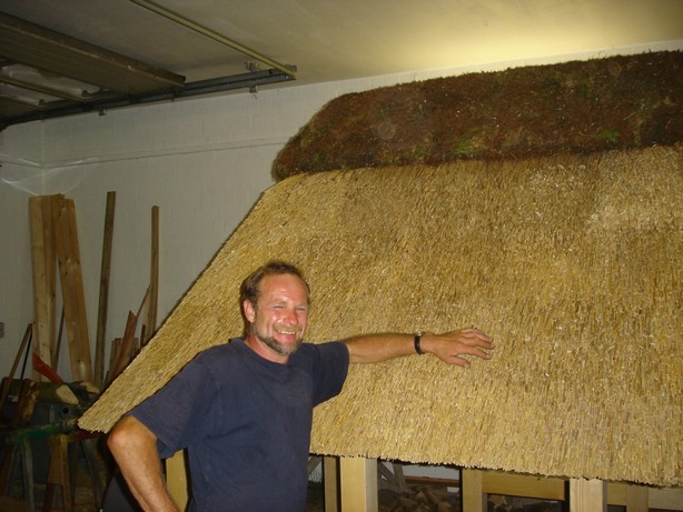 schlachter_pointing_his_thatched_roof.JPG